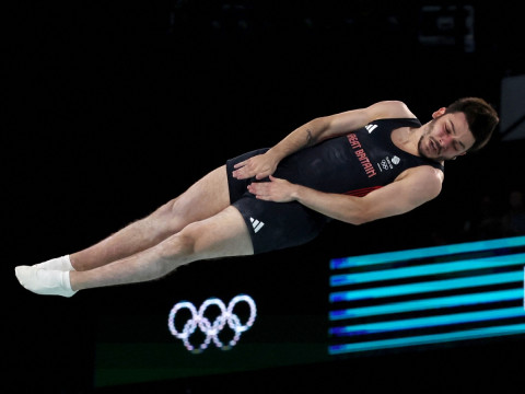 Zak Perzamanos inicia final en Gimnasia de trampolín. (Reuters).